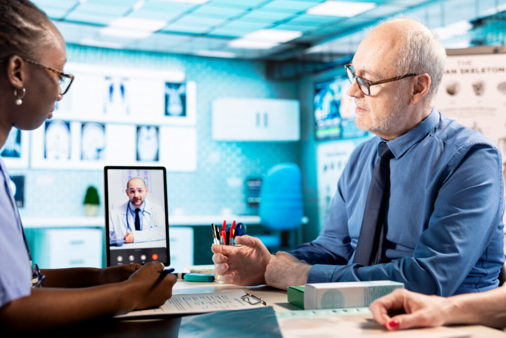 Patient discussing a chronic condition with a care team during a principal care management telehealth consultation